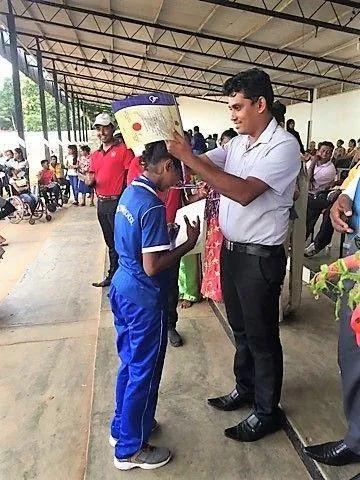 Kumari gets one of her medallion.